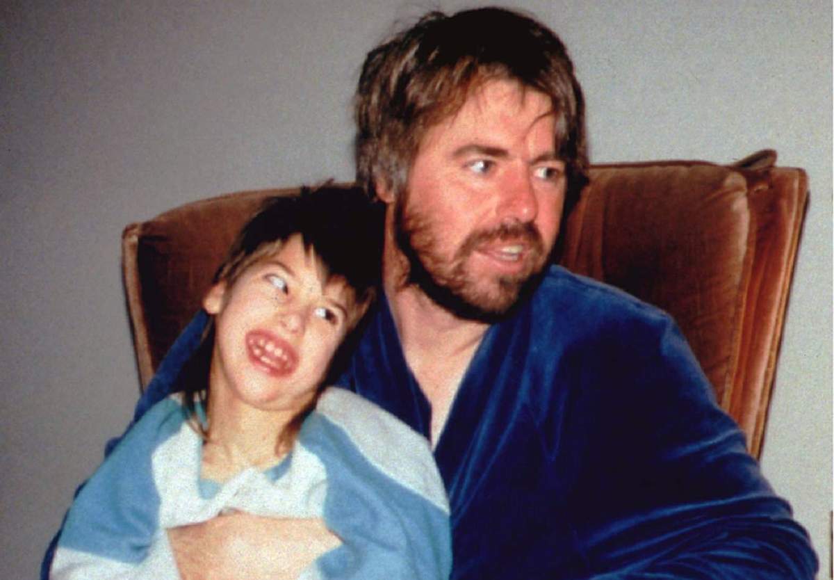 This is a photo of Robert Latimer and daughter Tracy  at home. 