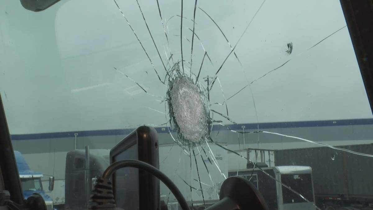 The damage to the windshield of a truck caused by a flying object, which the driver says was thrown by two teenagers from an overpass in Abbotsford on Nov. 15, 2019.