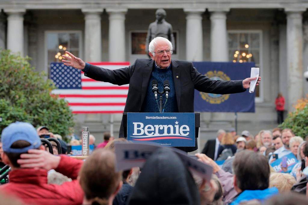 In this Oct. 31, 2019, file photo, Democratic presidential candidate Sen. Bernie Sanders, I-Vt., gestures during a rally after filing to be listed on the New Hampshire primary ballot at the Statehouse in Concord, N.H.  (AP Photo/Charles Krupa, File)