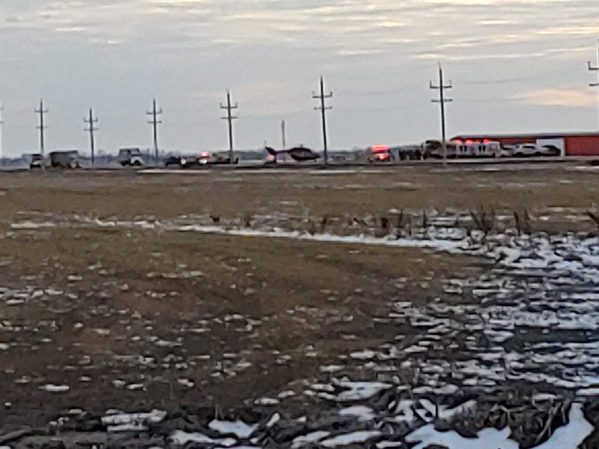 Several ambulances and the STARS air ambulance are seen on Hwy. 59 near Otterburne.