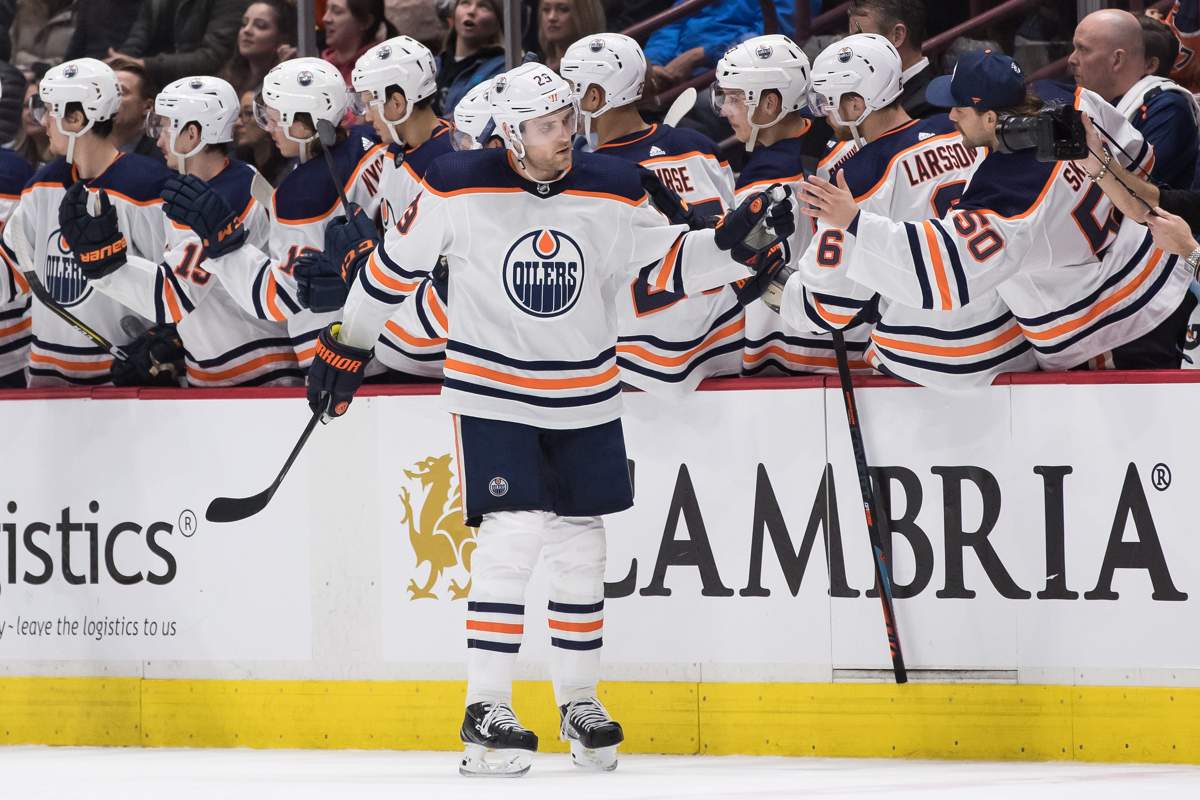 Edmonton Oilers' Leon Draisaitl, of Germany, celebrates after scoring against the Vancouver Canucks during the second period of an NHL hockey game in Vancouver, on Sunday December 1, 2019. THE CANADIAN PRESS/Darryl Dyck.