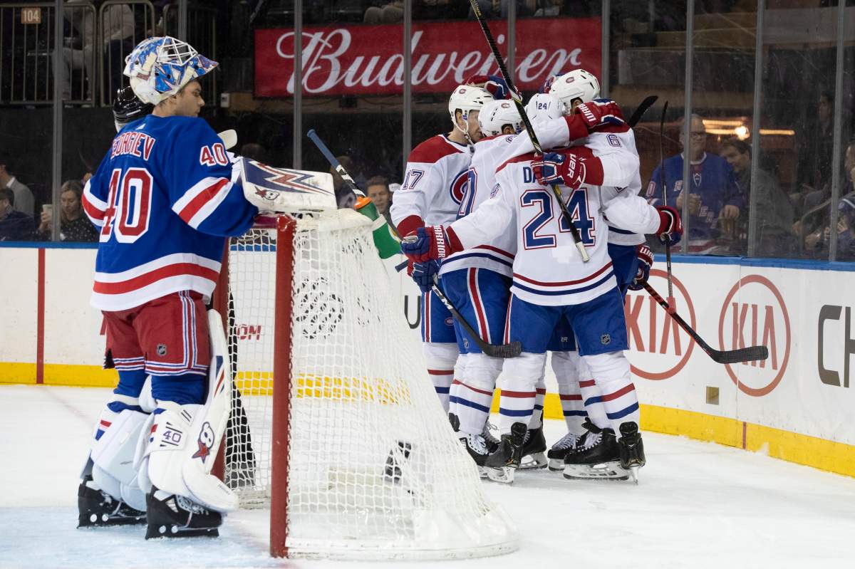 New York Rangers goaltender Alexandar Georgiev (40) reacts as the Montreal Canadiens celebrate a goal by right wing Brendan Gallagher (11) during the first period of an NHL hockey game Friday, Dec. 6, 2019, at Madison Square Garden in New York. 