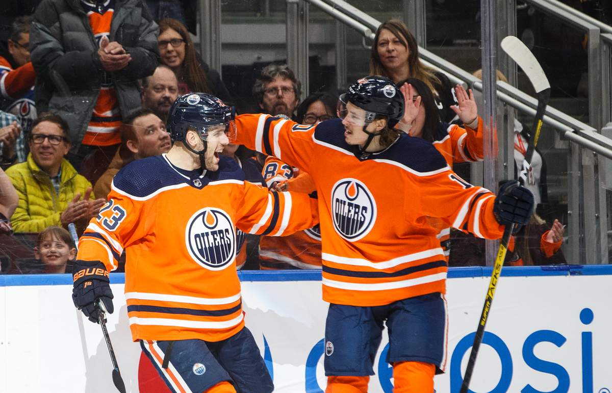 Edmonton Oilers' Riley Sheahan (23) and Joakim Nygard (10) celebrate a goal against the Buffalo Sabres during second period NHL action in Edmonton, Alta., on Sunday December 8, 2019. 