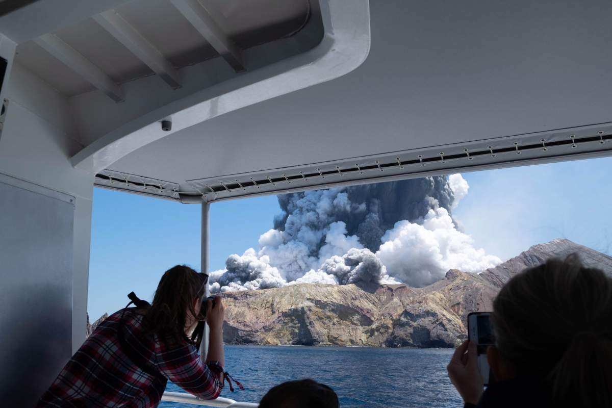 An image provided by visitor Michael Schade shows White Island (Whakaari) volcano, as it erupts in the Bay of Plenty, New Zealand on Dec. 9, 2019.