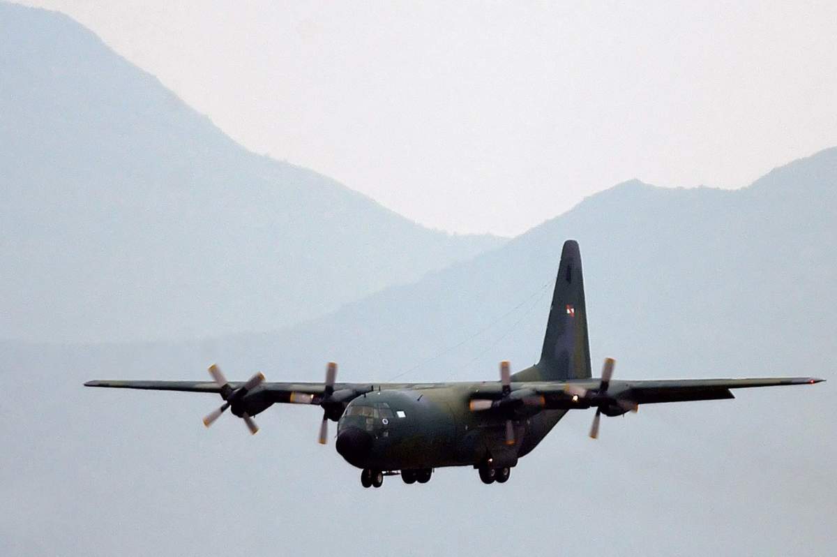 A C-130 military transport plane arrives at Arturo Merino Benitez International Airport in Santiago de Chile, Chile, April 18, 2006.