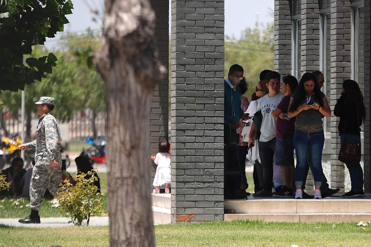 Relatives of crew members and passengers of a the missing C-130 military plane arrive to the Chilean Air Force headquarters in Santiago, Chile, Dec. 10, 2019.