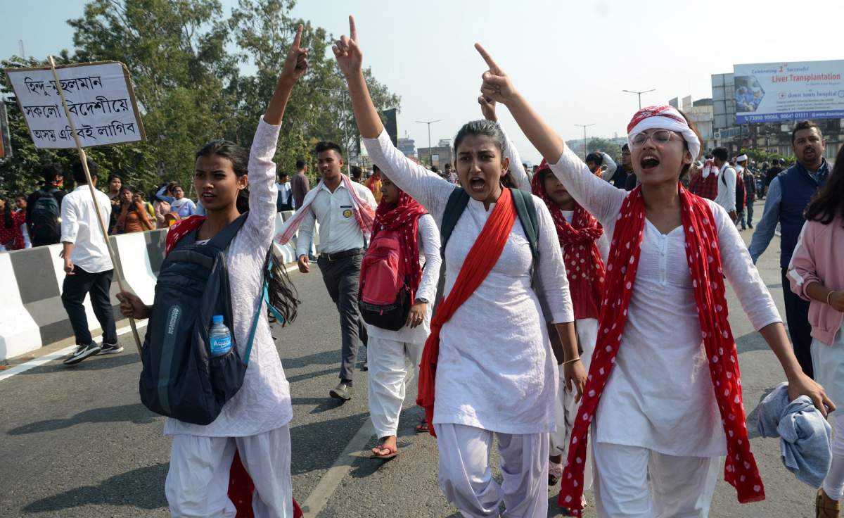 Students shout slogans during a protest against the Citizenship Amendment Bill in Guwahati, Assam, India, Dec. 11, 2019.