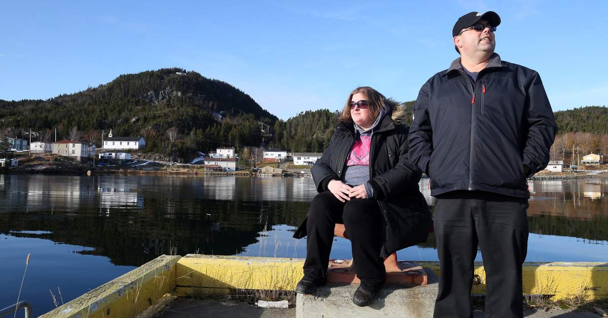 Amy Glavine and her partner, Wayne Grimes enjoy the view of Little Bay Islands, N.L. on Friday, November 15, 2019. They hope to return to the community during the summer months. Little Bay Islanders are saying goodbye as the Newfoundland and Labrador town resettles, but some are eyeing a return. 