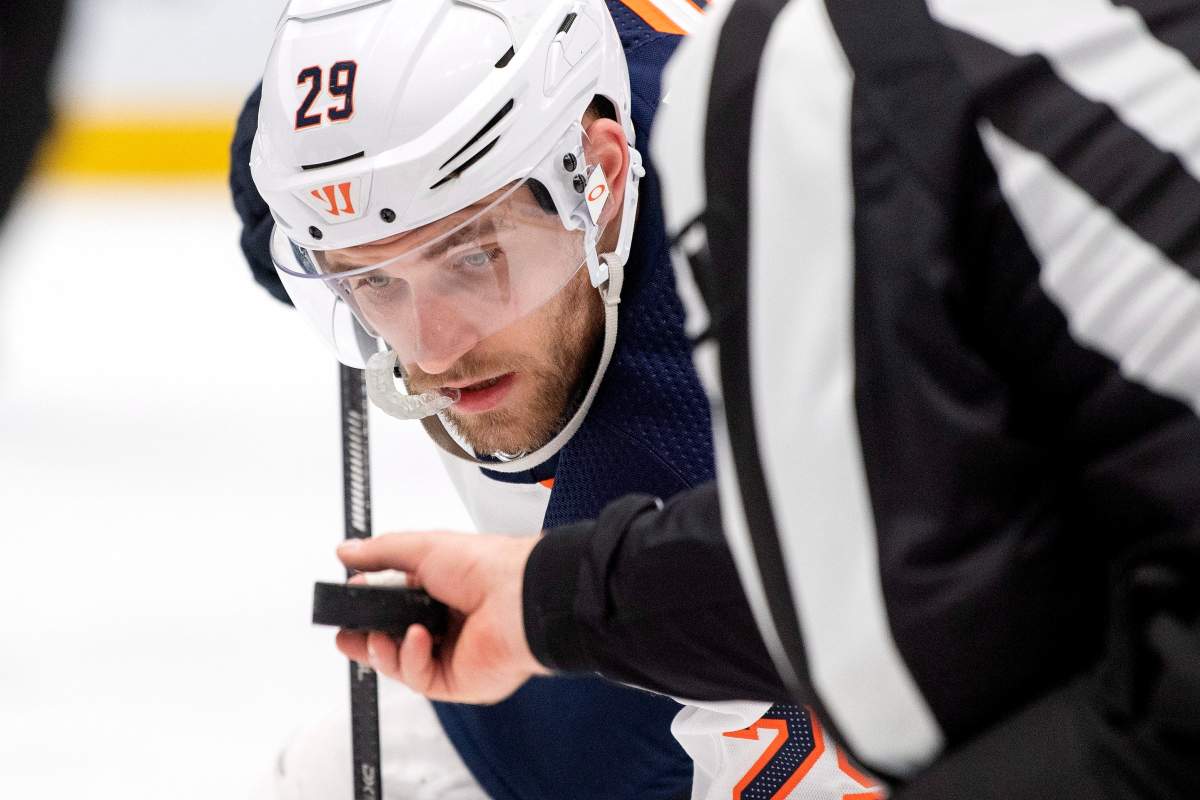 Edmonton Oilers center Leon Draisaitl (29) eyes the puck before a faceoff against the Dallas Stars in the third period of an NHL hockey game, Monday, Dec. 16, 2019, in Dallas. Edmonton won 2-1. (AP Photo/Jeffrey McWhorter).