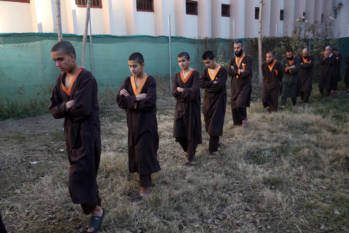 Islamic State militants either arrested or surrounded by the Afghan government are presented to media in Kabul, Afghanistan, Dec. 21, 2019.