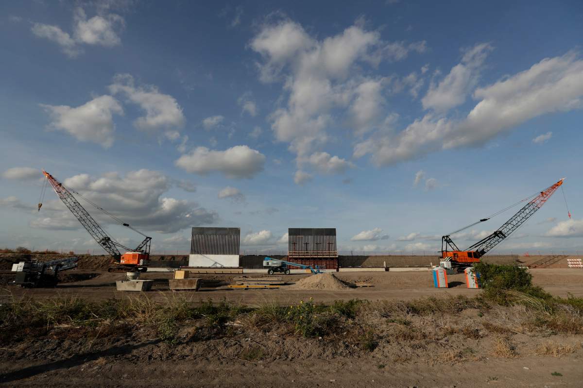 In this Nov. 7, 2019, photo the first panels of levee border wall are seen at a construction site along the U.S.-Mexico border in Donna, Texas.