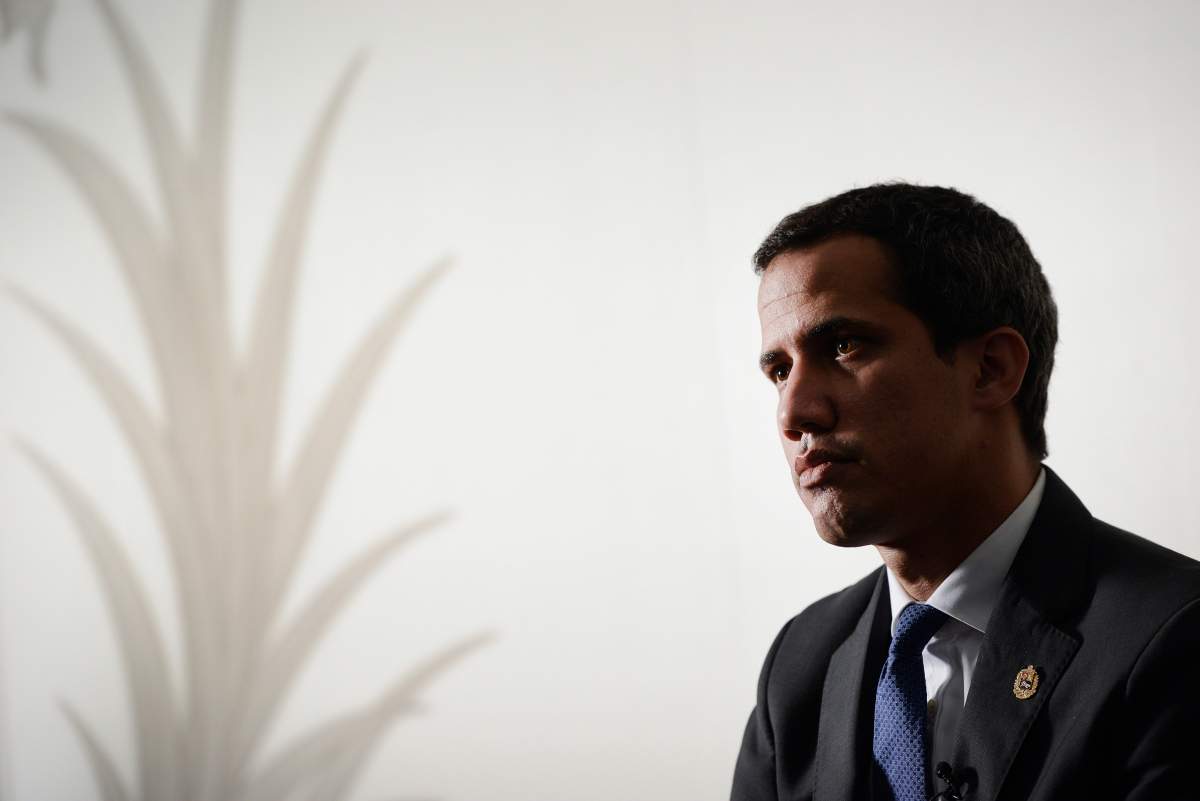 In this Dec. 16, 2019 photo, Venezuela’s National Assembly President and self-proclaimed interim President Juan Guaido speaks during an interview with the Associated Press in Caracas, Venezuela.