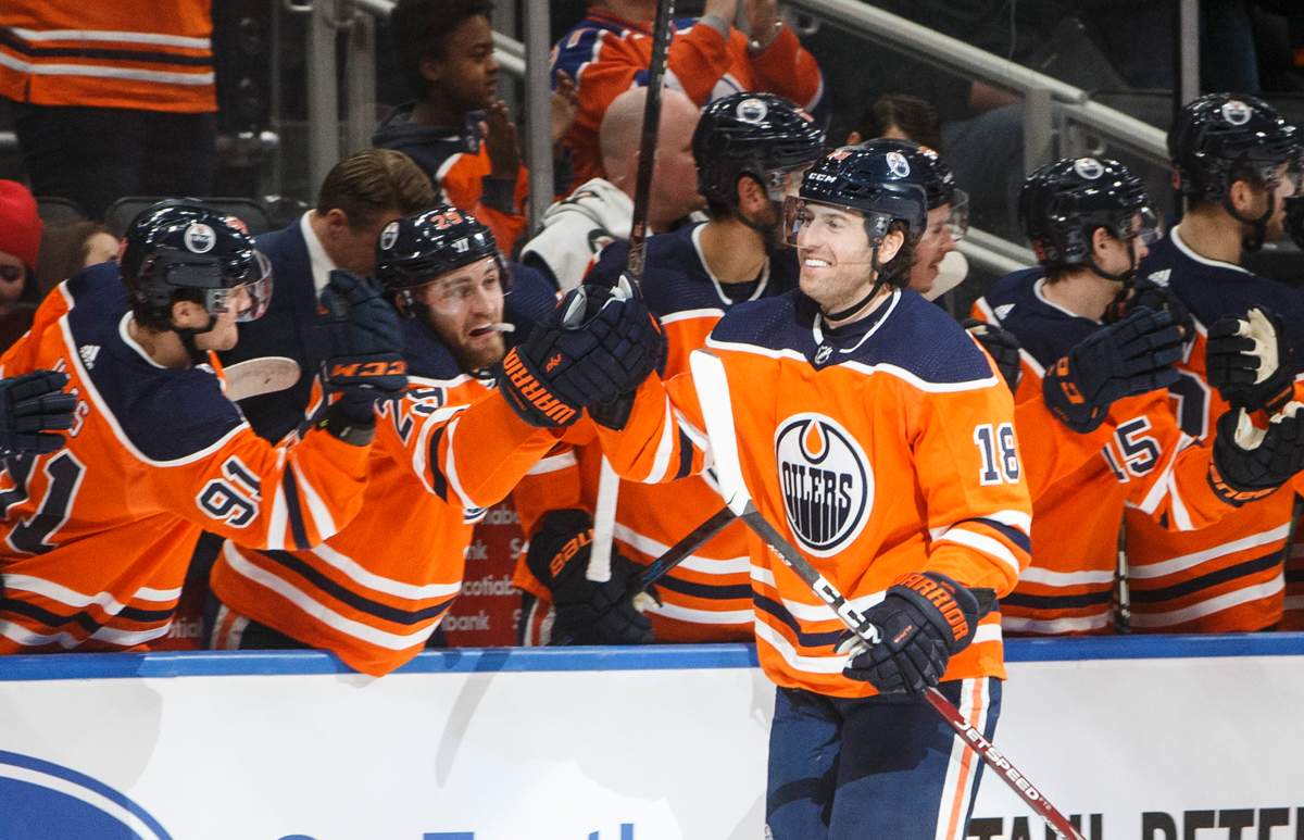 Edmonton Oilers' James Neal (18) celebrates a goal with teammates during first period NHL action against the New York Rangers, in Edmonton, Tuesday, Dec. 31, 2019. THE CANADIAN PRESS/Jason Franson.