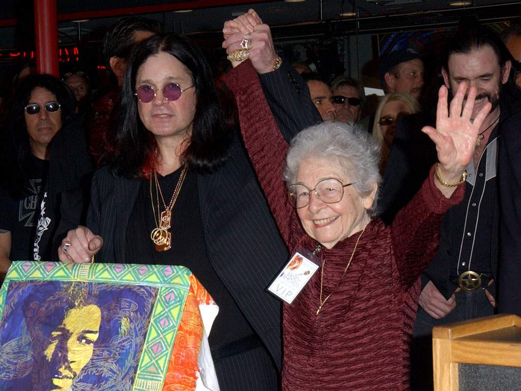 (L-R) Ozzy Osbourne and Delores Rhoads attend the ceremony to posthumously induct Randy Rhoads into the Hollywood Rockwalk in Hollywood, Calif., on March 18, 2004.