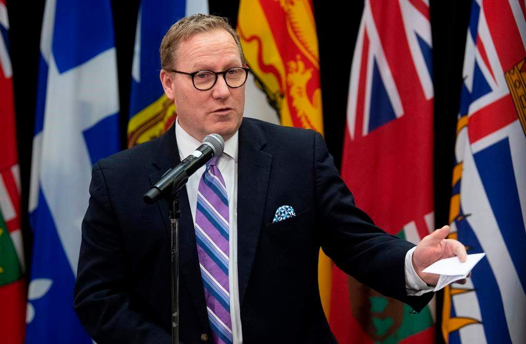 Mantiba Finance Minister Scott Fielding speaks with the media before a meeting with federal and provincial counterparts in Ottawa, Tuesday, Dec. 17, 2019. THE CANADIAN PRESS/Adrian Wyld.