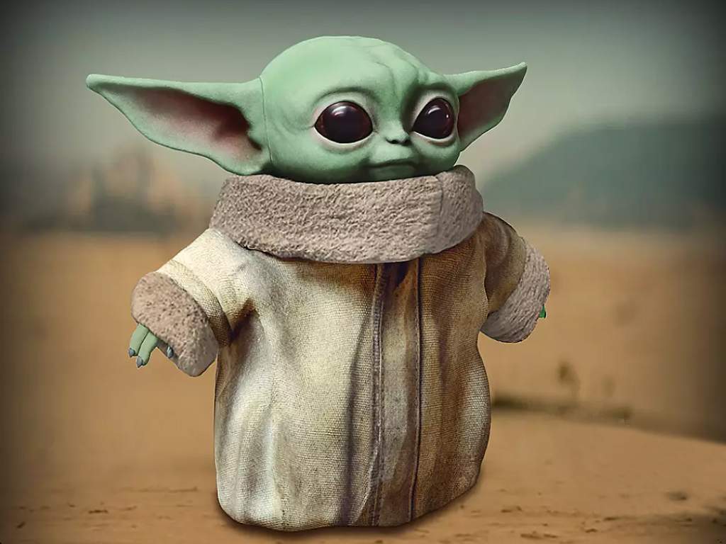 'The Child' or Baby Yoda official 11-inch plush doll by Mattel, inspired by Disney's 'The Mandalorian.'.