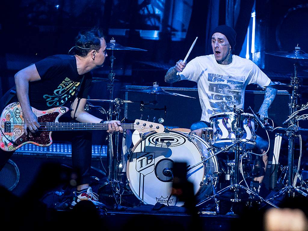 Blink-182 bass player Mark Hoppus and drummer Travis Barker perform with the band at the Xcel Energy Center.