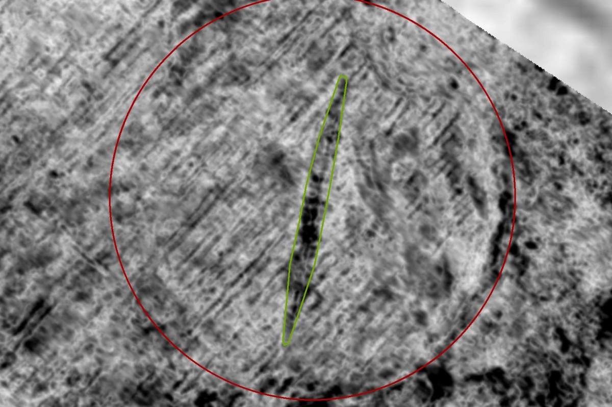 A buried Viking ship is shown in a farmer’s field in Norway.