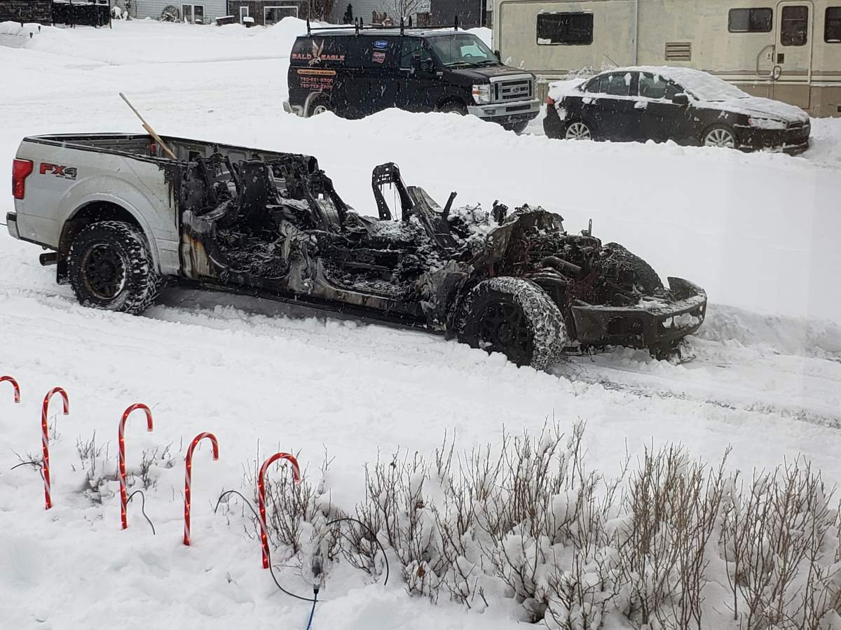 A truck destroyed by fire in Edson, Alta. on Monday, December 9, 2019.