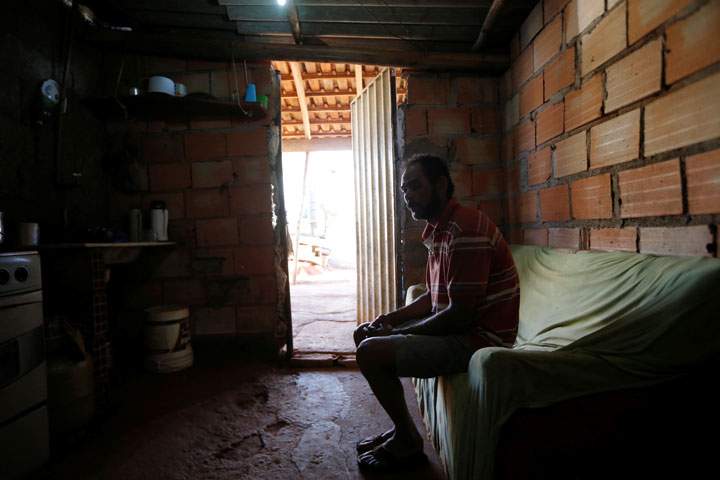 Farm worker Lucio Bispo de Souza is seen in his accommodation after working on a coffee farm, during a labour ministry operation to identify workers in conditions analogous to slavery, in Santa Rosa da Serra, Minas Gerais State, Brazil August 13, 2019.