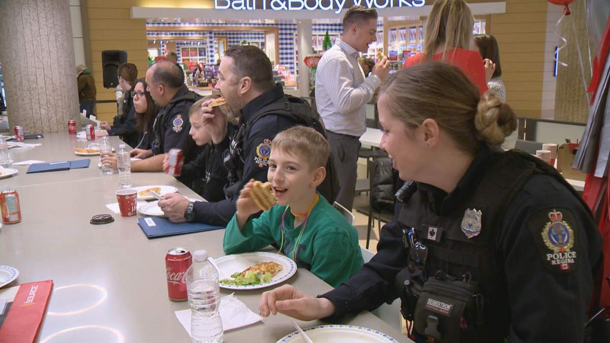 Regina police joined 20 students at the Cornwall Centre for the fifth annual CopShop.