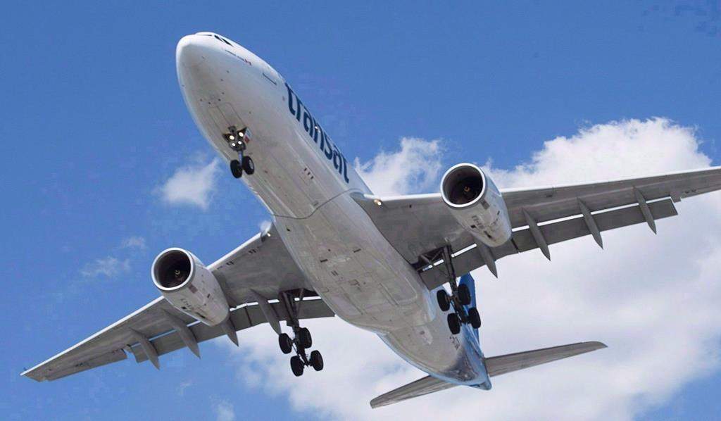 An Air Transat Airbus A330 lands at Montreal's Trudeau Airport, Sunday, July 31, 2016.