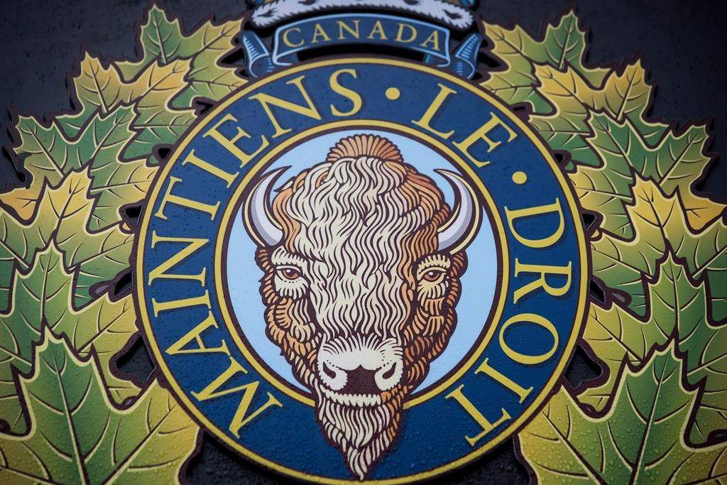 The RCMP logo is seen outside Royal Canadian Mounted Police "E" Division Headquarters, in Surrey, B.C., on Friday April 13, 2018.