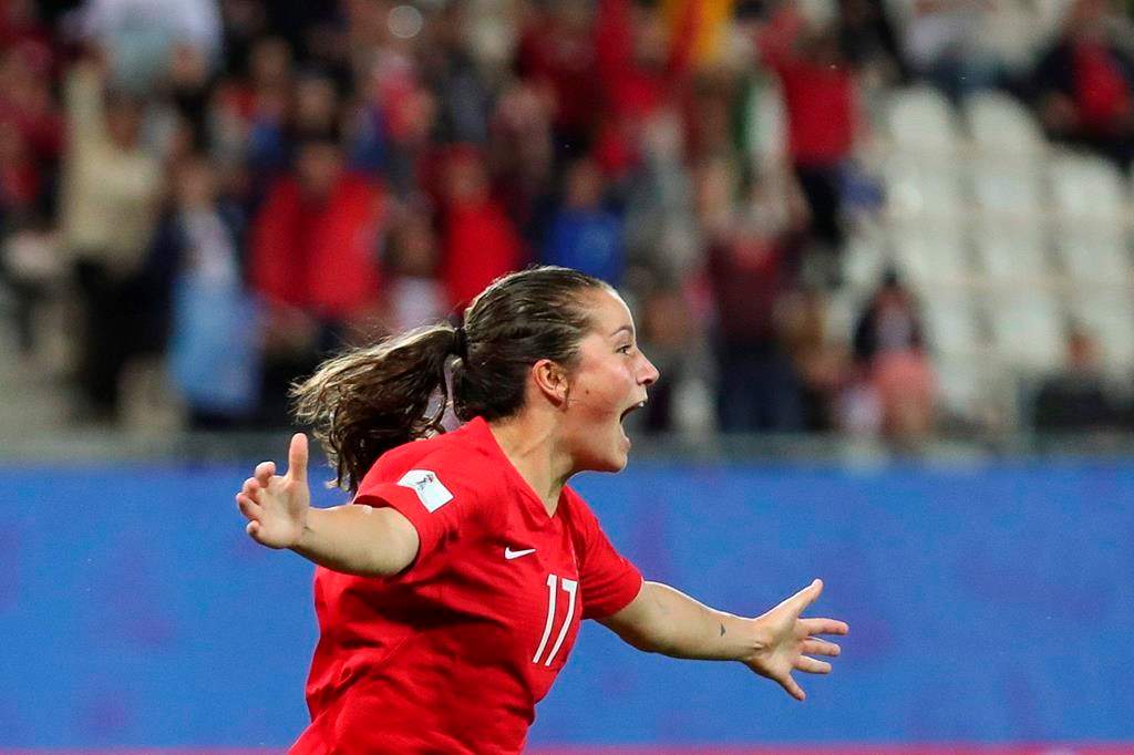 Canada's Jessie Fleming celebrates after scoring her side's opening goal during the Women's World Cup Group E soccer match between Canada and New Zealand in Grenoble, France, Saturday, June 15, 2019.