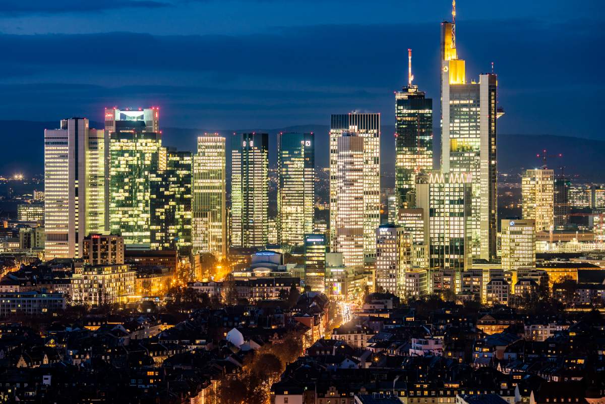 The bank towers of Frankfurt, Germany stand close together in the evening light from a house on the opposite Sachsenhausen mountain on November 29, 2019.