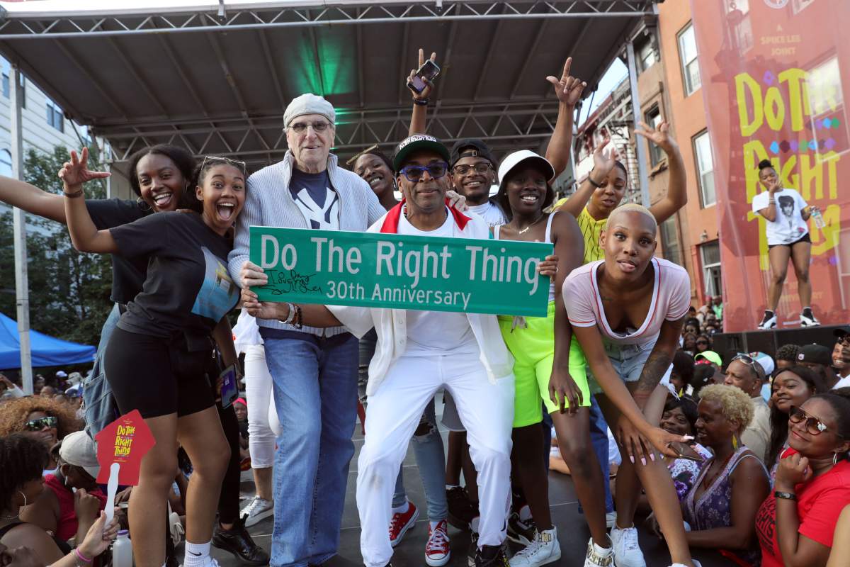 Danny Aiello (third from left) and Spike Lee (centre) pose with guests at the 30th Anniversary ‘Do the Right Thing’ block party on June 30, 2019 in Brooklyn, N.Y. (Photo by Johnny Nunez/WireImage)