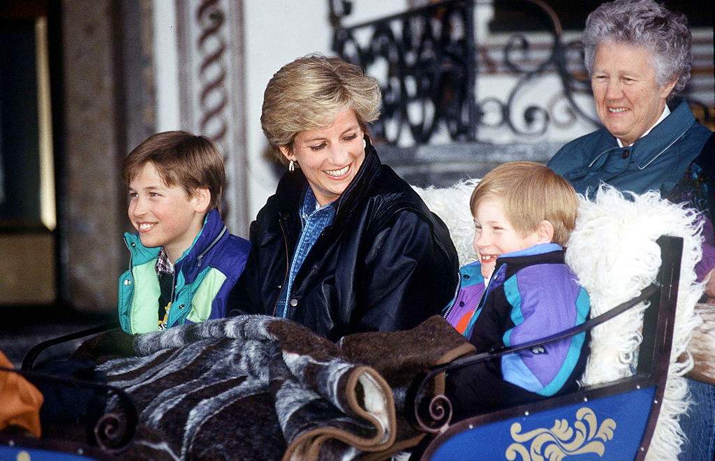 Princess Diana, Prince William, Prince Harry and their former nanny, Olga Powell, ride in a carriage in Lech, Austria, in March 1993.