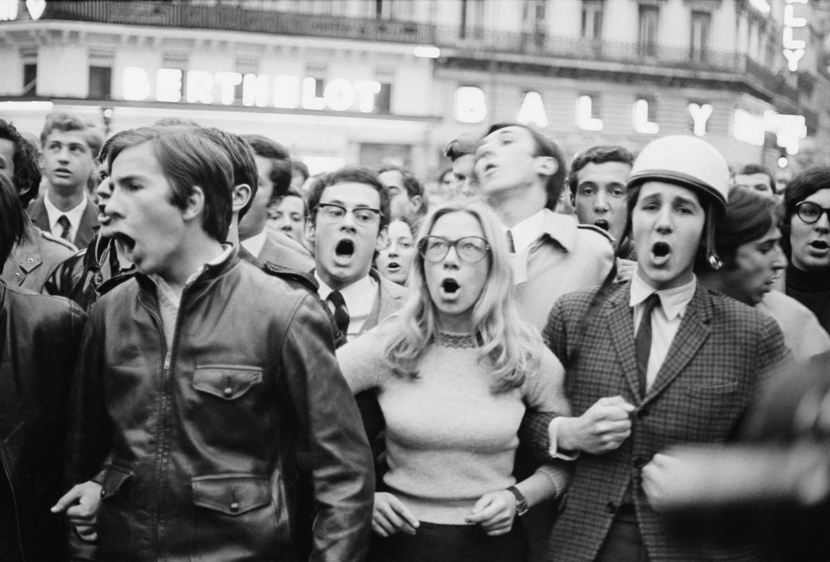 Students link arms during civil unrest in Paris, France, on May 30, 1968.