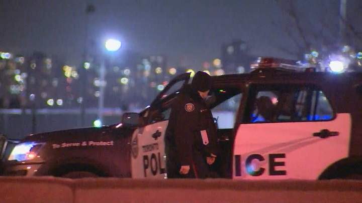 Toronto police investigating the scene along Highway 400 in Toronto.