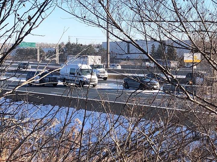 Police canvassing Highway 401 near Whites Road in Pickering following a shooting.