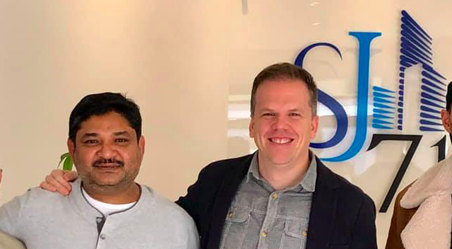 Md. Tarekh Rana (left) with Liberal MP Mark Holland at the office of Ajax development firm SJ71 Ltd.