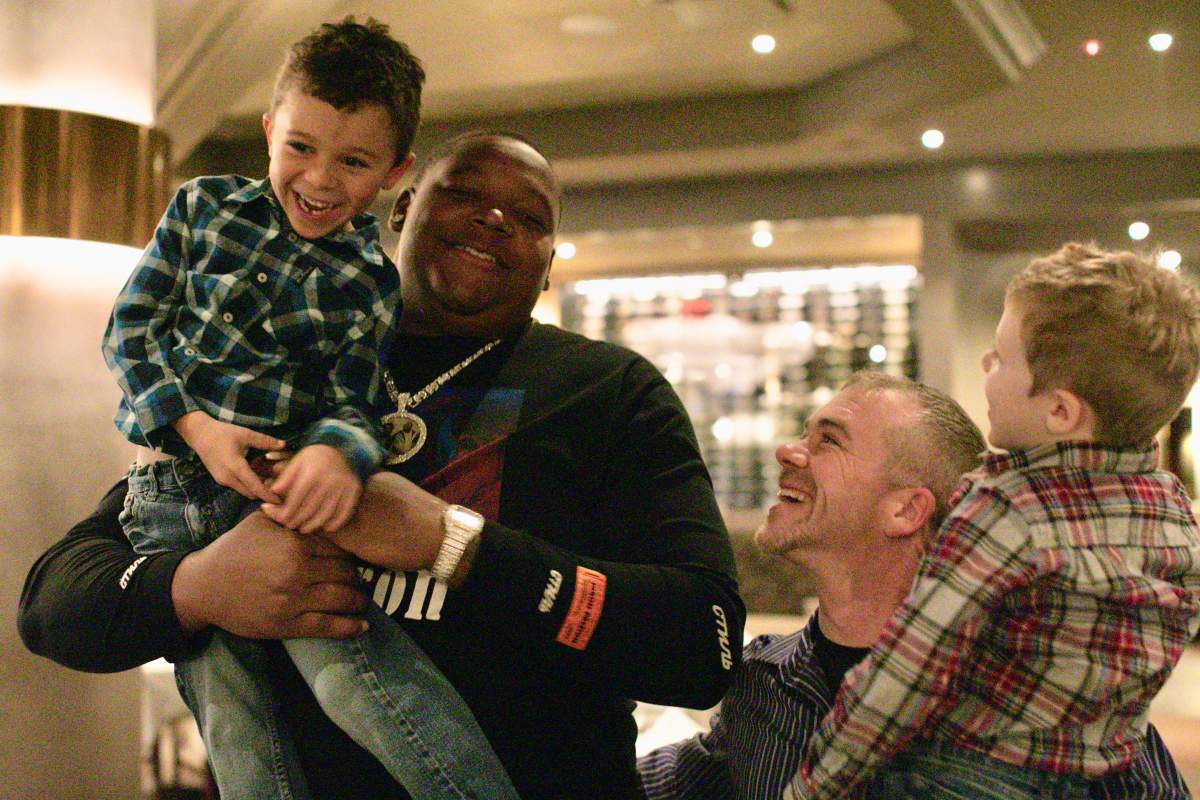 Alec Rhodes and his sons were invited to a steak dinner with Brown and then on the sidelines for practice.