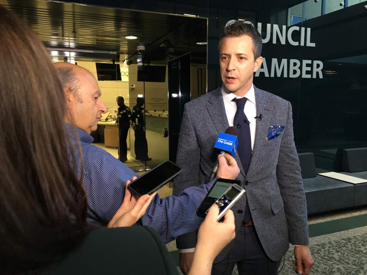 Calgary Councillor Jeff Davison addresses the media after announcing the Calgary arena/event centre deal was finalized.
