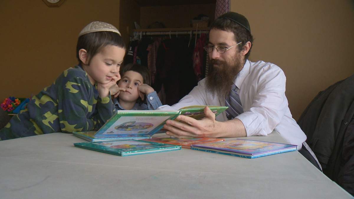 Regina Rabbi Avrohom Simmonds imparts Jewish teachings to his children. Roberta Bell / Global News