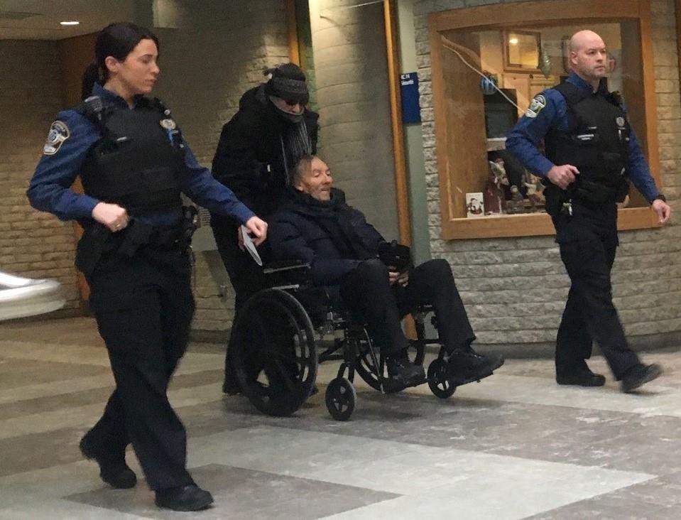 Francois Lamarre, a retired Montreal police and former minor league hockey coach in Greenfield Park, Que., appears for his arraignment at the courthouse in Longueuil, Que., Thursday, Dec.19, 2019 on various alleged sex crimes involving minors.