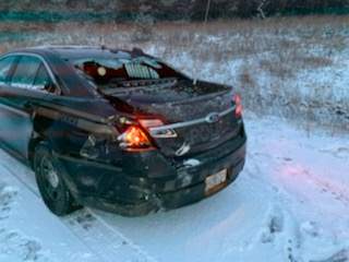 An OPP officer suffered minor injuries after a collision on Hwy. 401 near Grafton on Wednesday morning.