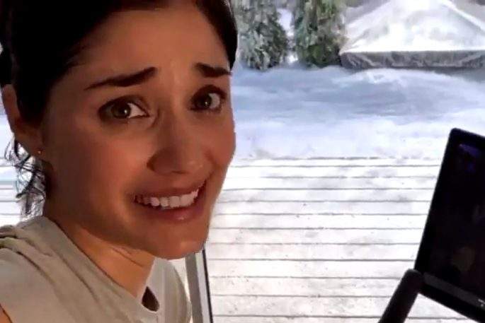 ‘Grace from Boston’ smiles nervously in this still image from a Peloton commercial.