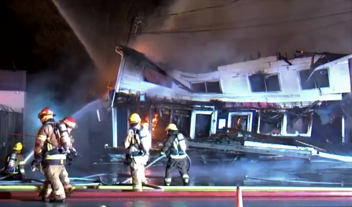 SQ police spokesman Stéphane Tremblay says both buildings are a total loss.