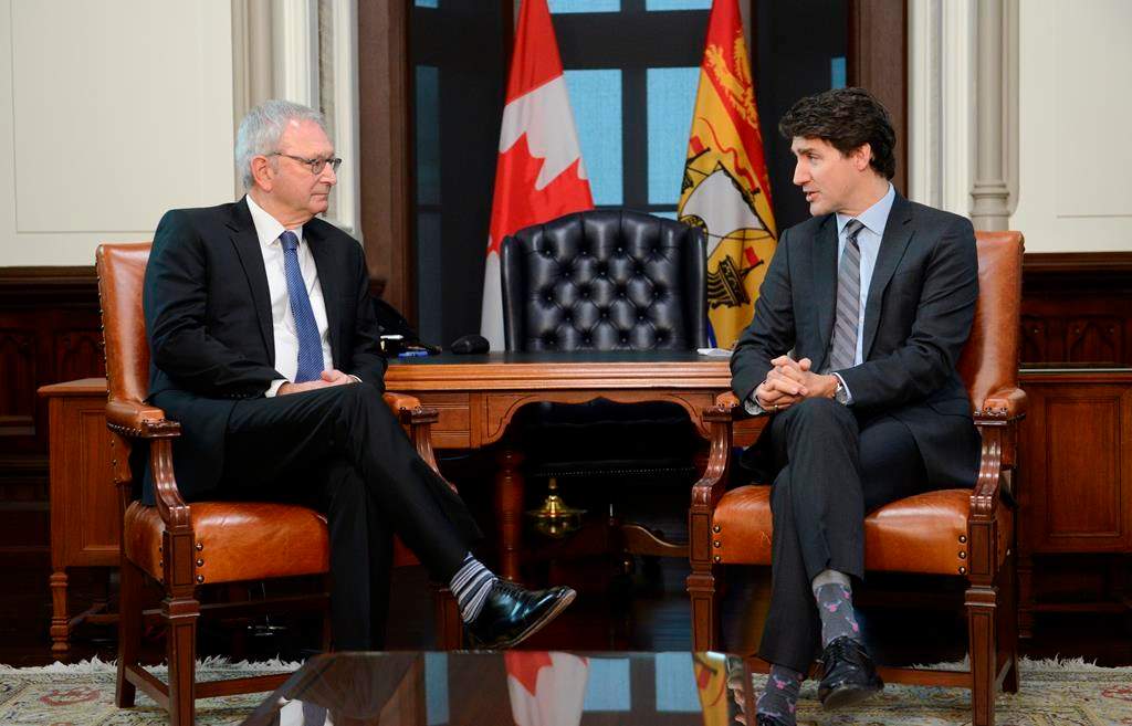 FILE - Prime Minister Justin Trudeau meets with Premier of New Brunswick Blaine Higgs on Parliament Hill in Ottawa on Monday, Dec. 16, 2019. THE CANADIAN PRESS/Sean Kilpatrick.