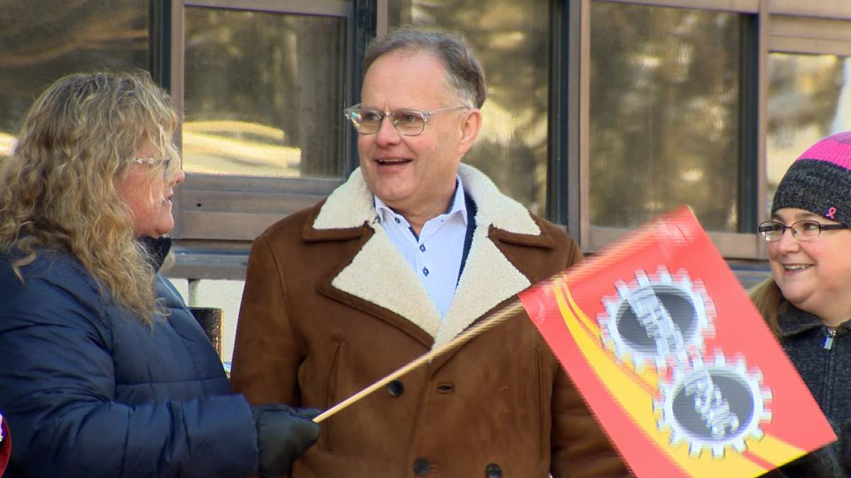 MP Wayne Long attends the rally to show his support.