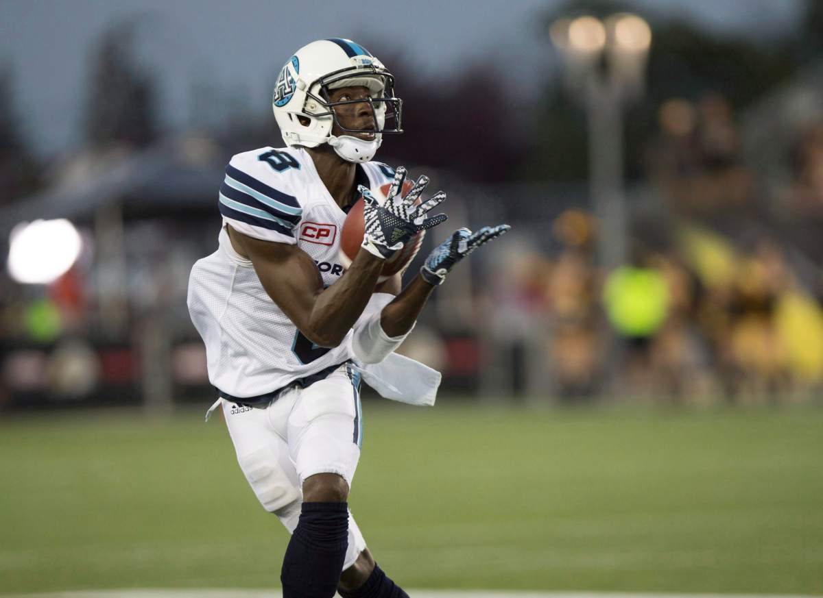 Toronto Argonauts wide receiver Kenny Shaw (8) makes a catch during first half CFL football action against the Hamilton Tiger-Cats in Hamilton, Ont., on Monday, September 5, 2016.