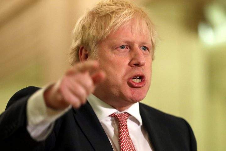 Britain's Prime Minister Boris Johnson speaks in the Stormont Parliament Buildings in Belfast, Northern Ireland, Jan. 13, 2020. 