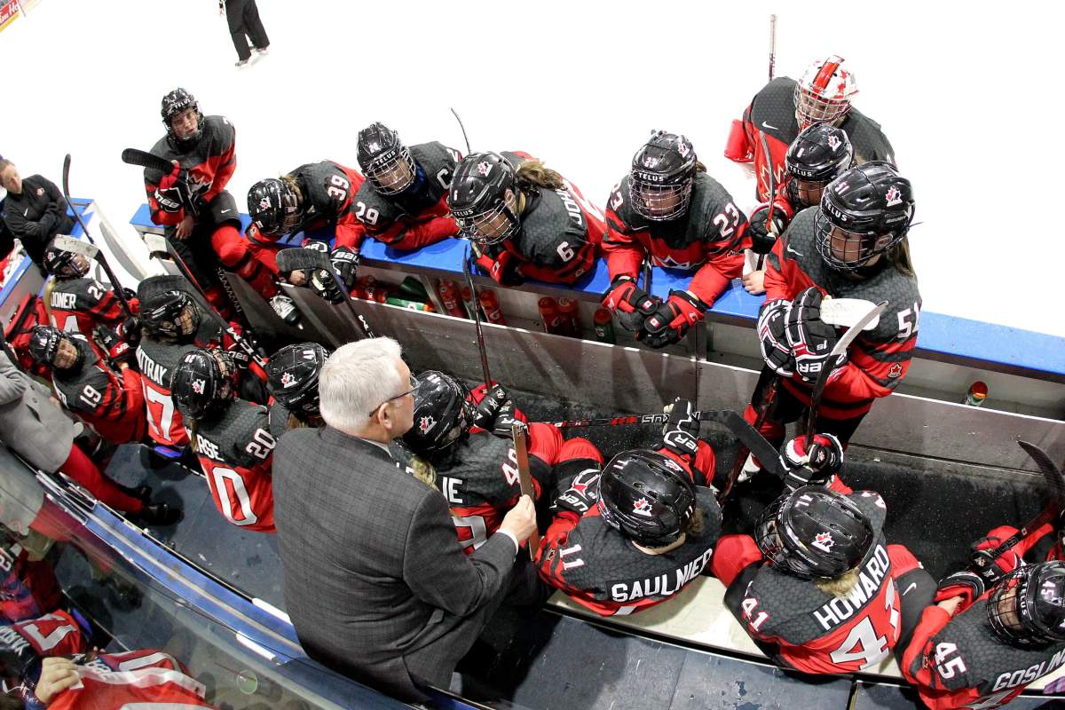 Canada players listen as coach Perry Pearn gives directions during third period National Women’s Team Rivalry Series hockey in London, Ont., on Tuesday, February 12, 2019.
