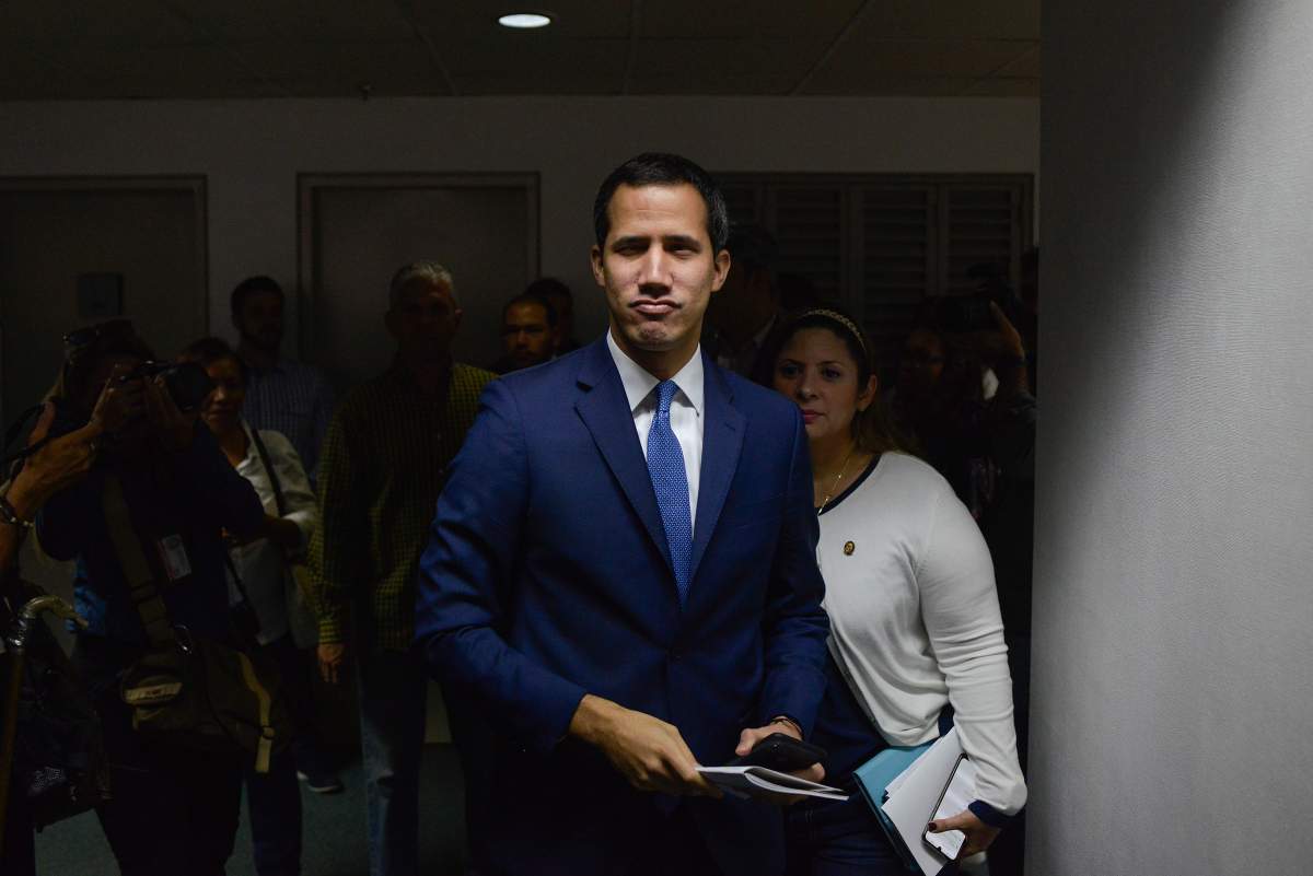 Opposition leader Juan Guaido arrives for a press conference in Caracas, Venezuela, Monday, Jan. 6, 2020.