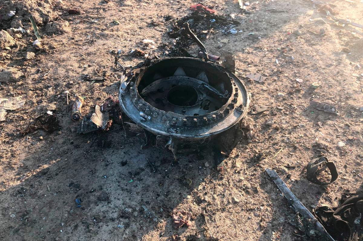 Debris is seen from a plane crash on the outskirts of Tehran, Iran, Wednesday, Jan. 8, 2020. A Ukrainian airplane carrying at least 170 people crashed on Wednesday shortly after takeoff from Tehrans main airport, killing all onboard, state TV reported.