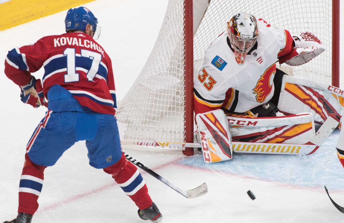 Montreal Canadiens' Ilya Kovalchuk moves in on Calgary Flames goaltender David Rittich during first-period NHL hockey action in Montreal on Monday, January 13, 2020.